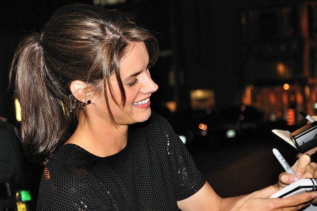 Missy signing autograph with her left hand